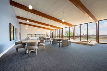 a large room with tables and chairs